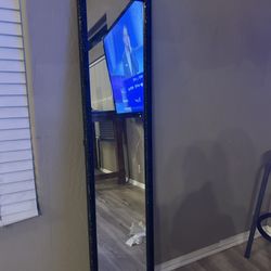 skinny black framed mirror 