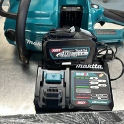 Brand New Never Used Makita GCU06T1 With Battery Charger And Blade