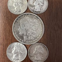 1892S Morgan Dollar And (4) 1964 Washington Silver Quarters