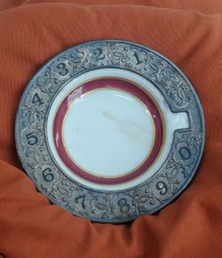 Vintage Gorham electroplate silver rim ashtray featuring a rotary phone dial design