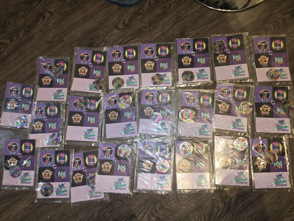 GREAT vintage set LOT Of 23 (yes 23 actually) Sealed in Package Disneyland 1994 POG game w/ Slammer Kids. Act fast!
