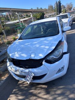 Hyundai Elantra White Sedan – Collision Damage