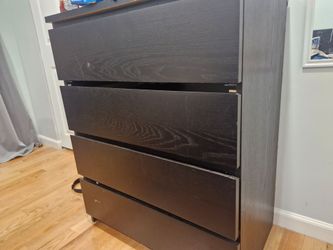 Large black dresser with 4 drawers