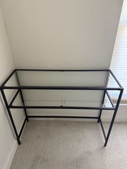 Black metal and glass console table