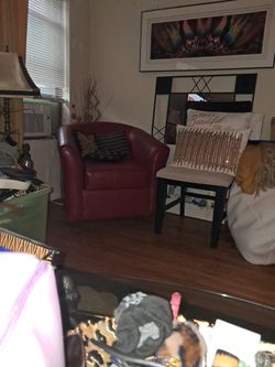 Red Leather  Swivel  Chair 40.00 