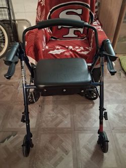 Adults Walker With Seat Good Conditionnn
