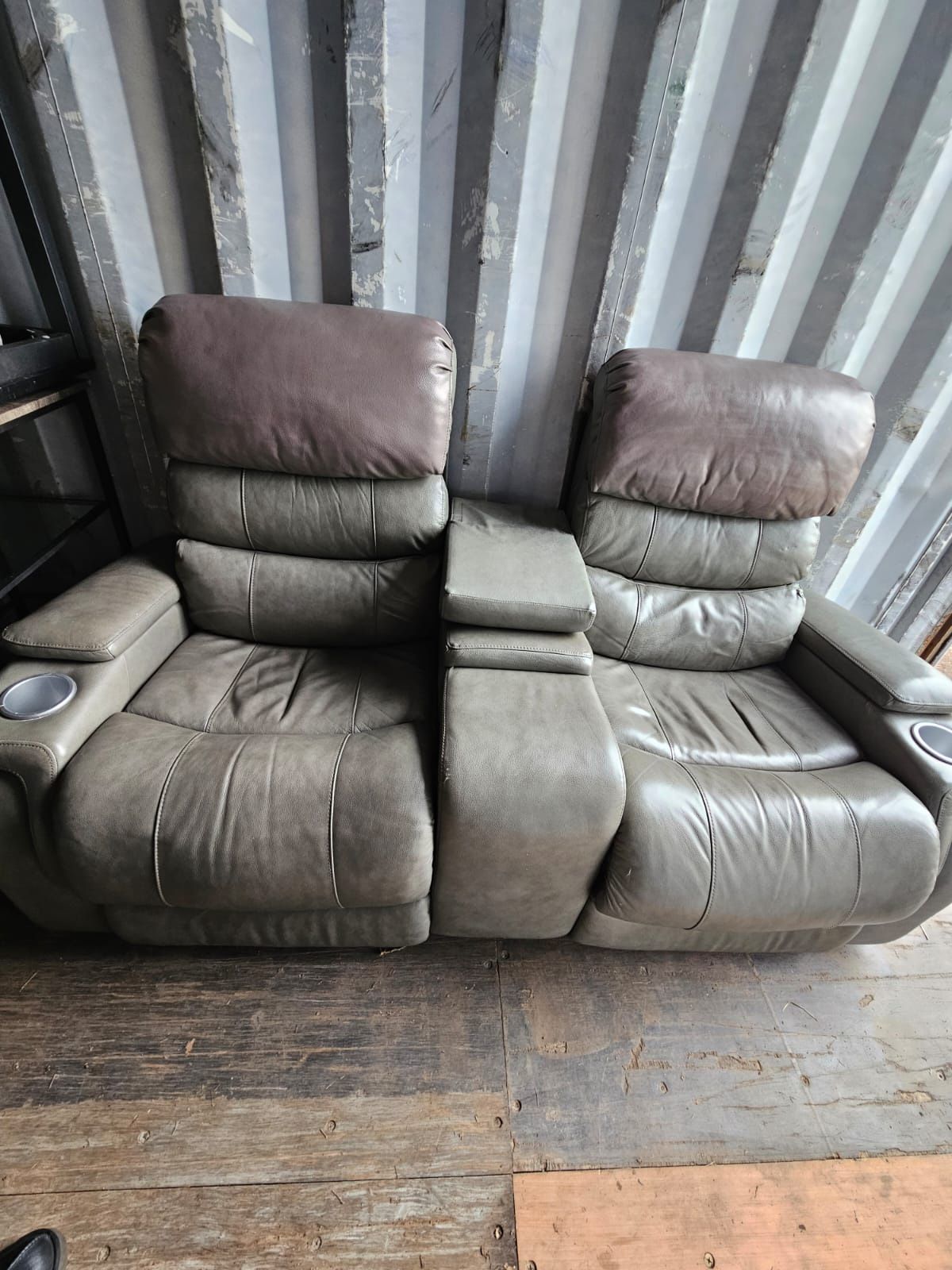Dwyer Double Reclining Sofa with Center Drop Down Cup Holders