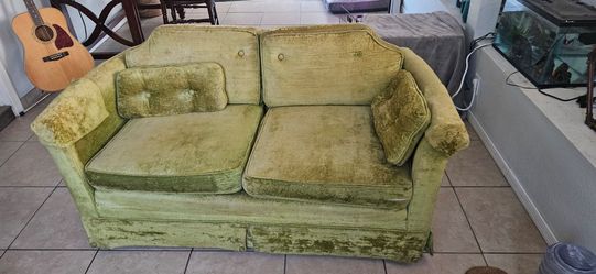 Free well loved 1976 crushed velvet green love seat
