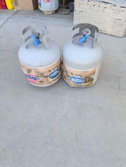 2 propane tanks $25 each full