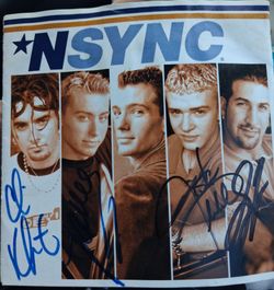 Nsync signed 1999 album cover.