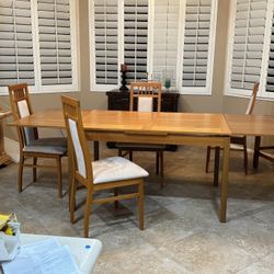 Dining Table VERY UNIQUE it  Extends On Both Sides