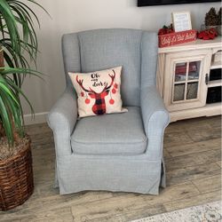 Gray Wing Backed Chair Used In Nursery 