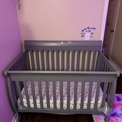 Baby Bed With A Changing Table With Storage.