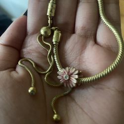 Pandora bracelet and charm worth $275.