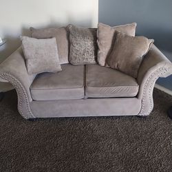 Couch and Love Seat with Decor