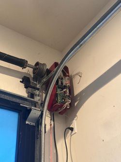 Garage Door Broken Spring Opener Off Track Adjustment Replace And Parts