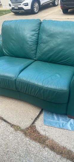 Leather sofa made in Italy, stood in the salon