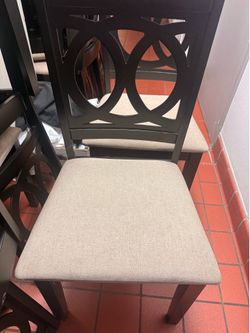 Black padded chairs