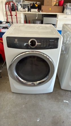 White Electrolux washer and dryer