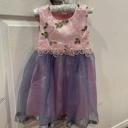 Baby girl white with purple, yellow, pink,peach& white.