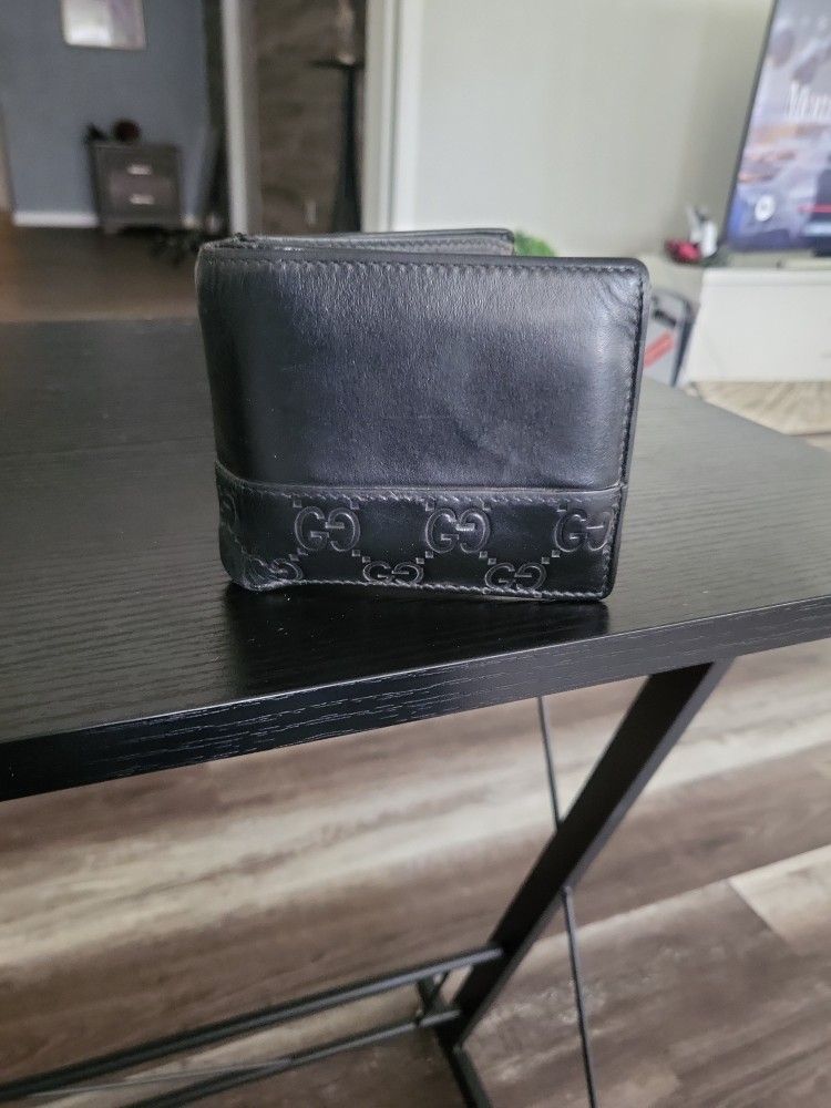 Gucci Signature Leather Wallet
