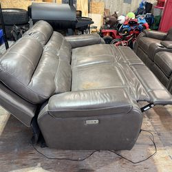 Brown leather electric reclining couch
