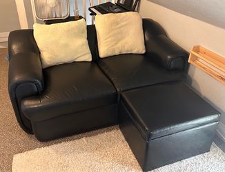 Black leather love seat sofa