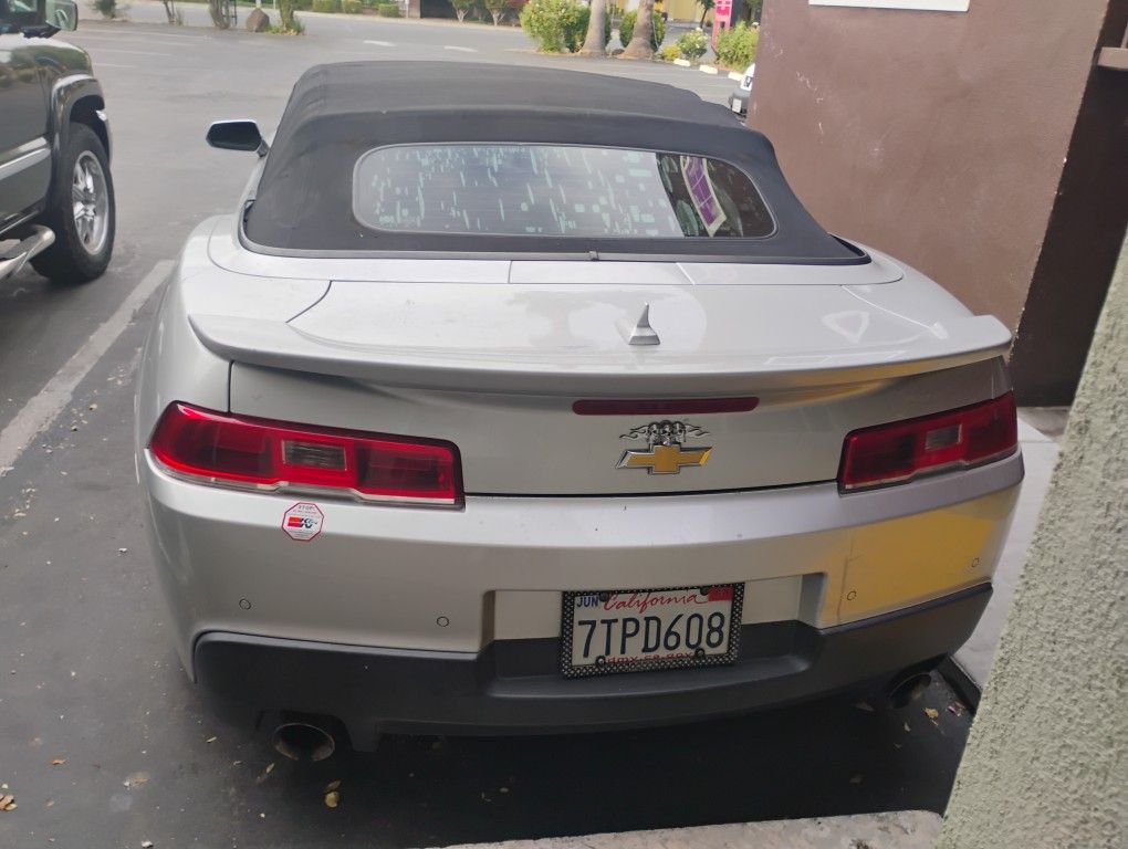 To 2014 Camaro With 91,000 MI Convertible Works Everything's Good On It Needs A New Air Conditioning Pump That's All Other Than That That's A Good Rid