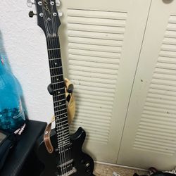 Epiphone Electric Guitar & Amp