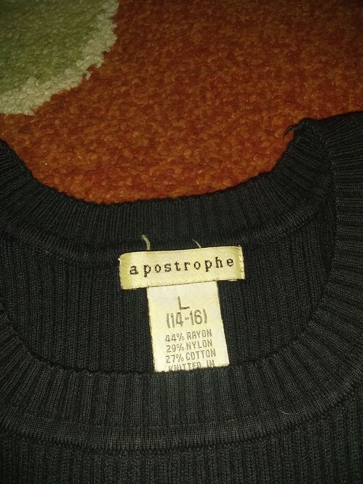 Apostrophe black knitted top