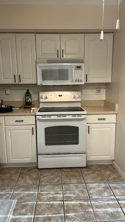 GE White Electric Range with Over-Range Microwave