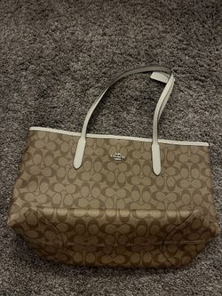 light brown coach purse