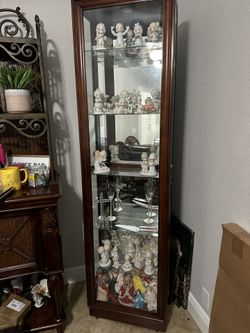 Curio cabinet W/precious Moments 