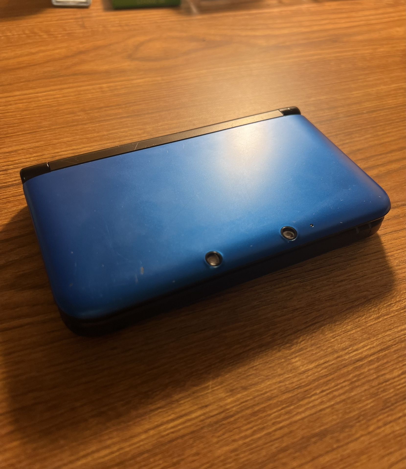 Blue/Black Nintendo 3DS XL with New Super Mario Bros. 2 And Charger