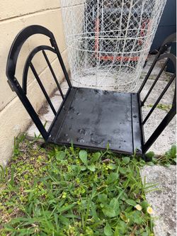 Heavy metal outside log holder