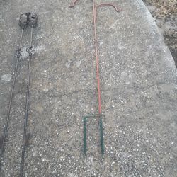 Plant Hanger & 2 TIKI TOURCHES.  PLANT HANGER 10.00 & $10.00 FOR BOTH TIKI TOURCHES.  Ok Condition PICKUP ONLY