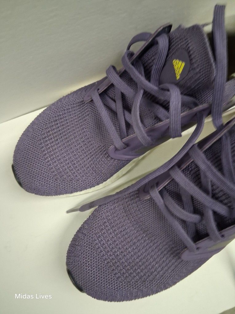 Adidas Ultraboost 20 running shoe in the "Tech Purple" colorway.