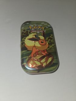 Complete opened Eevee mini tin with all accessories + extra packs