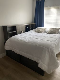 Full size wood platform bed with mattress include and plenty storage under the bed