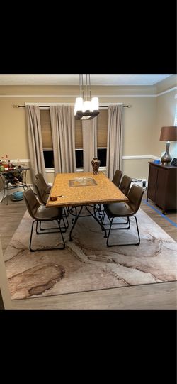 Arhaus Italian mosaic dining table with chairs of six with a Addison Rugs Chantille Beige Area Rug