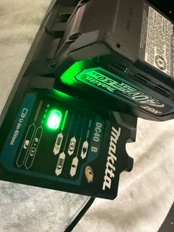 Makita Dual 40v Charger with 2 x5.0 batteries.
