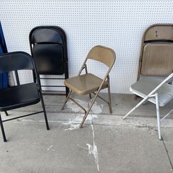 Nine metal folding chairs for sale