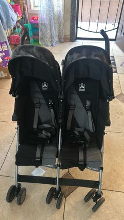 Maclaren twin stroller.
