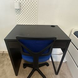 Black Single Drawer Micke IKEA Desk With Chair And Desk Attachment.