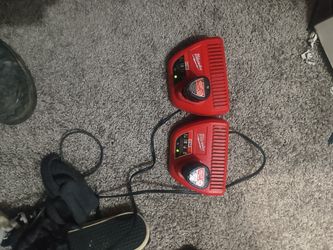 Two M12 Milwaukee  Chargers With 1.5 Battery And 2.0 Battery 