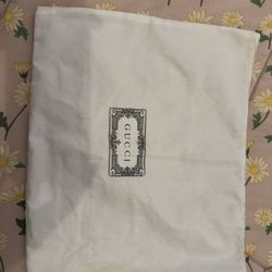 Gucci dust bag.