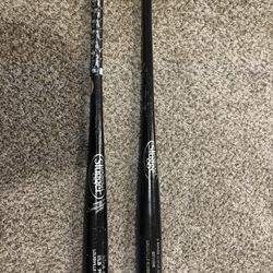 Two Louisville Slugger Genuine Baseball Bats 
