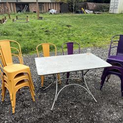 Metal folding table and 8 metal stacking chairs