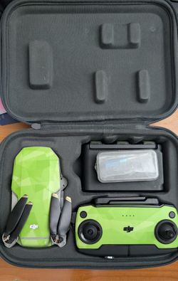 DJI Mavic Mini FlyMore Combo 4k Drone + Remote + 3 Batteries + extra propellers and camera guard.