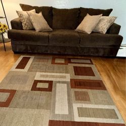 Couch, Pillows And Area Rug 